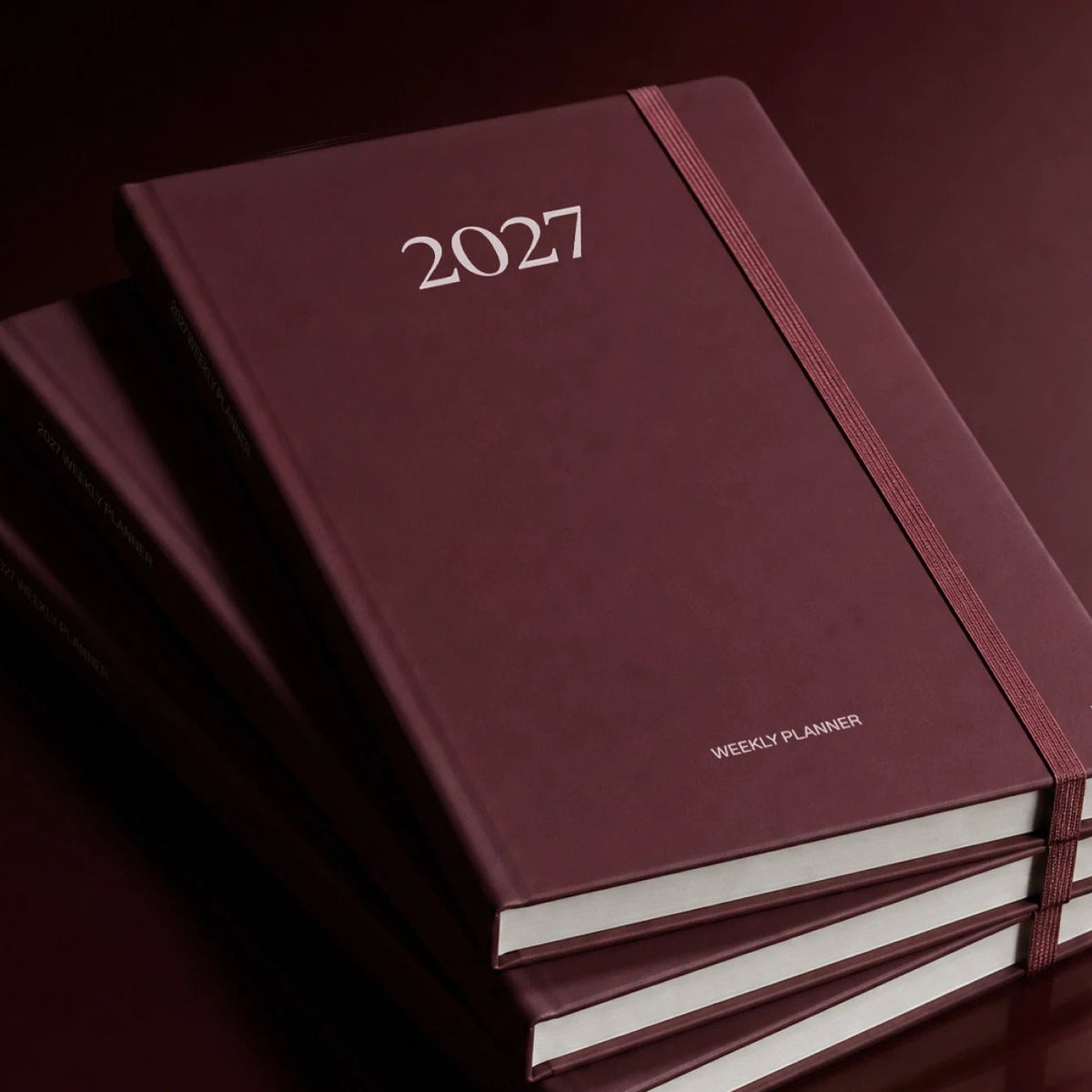 Weekly Planner 2027 – Stone Paper · A5 Hardcover · Burgundy | Karst