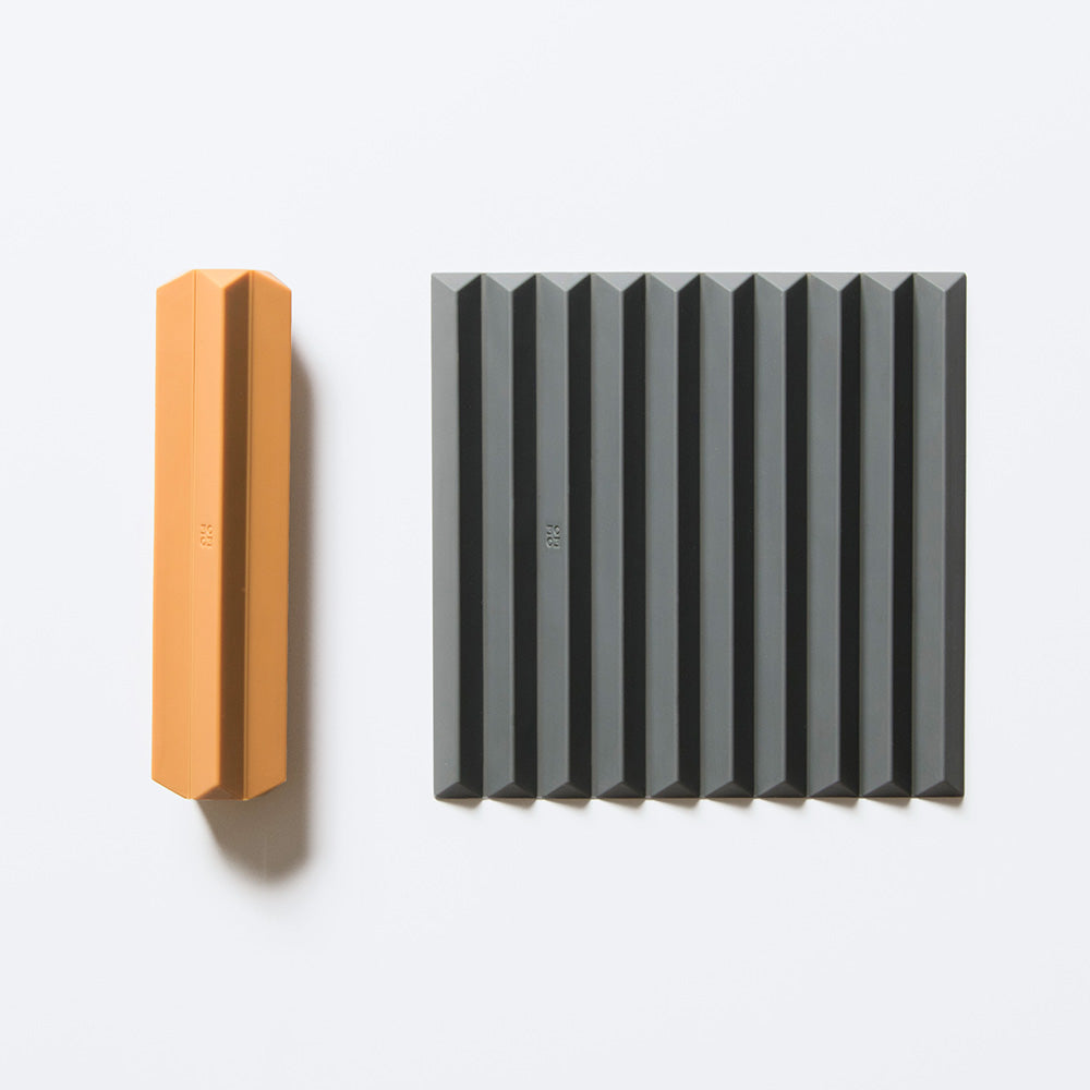 FLIP | faltbarer TOPFUNTERSETZER | Shane Schneck | Ommo
